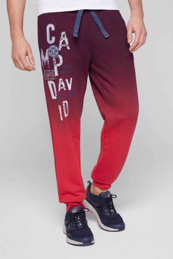 Jogginghose mit Artwork und Farbverlauf red sun / reef blue