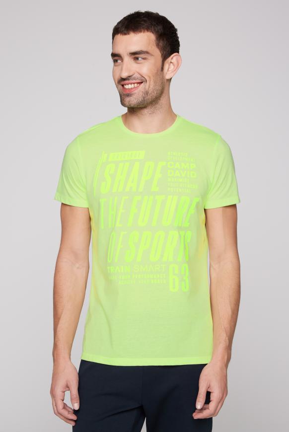 T-Shirt mit Print Artwork running green