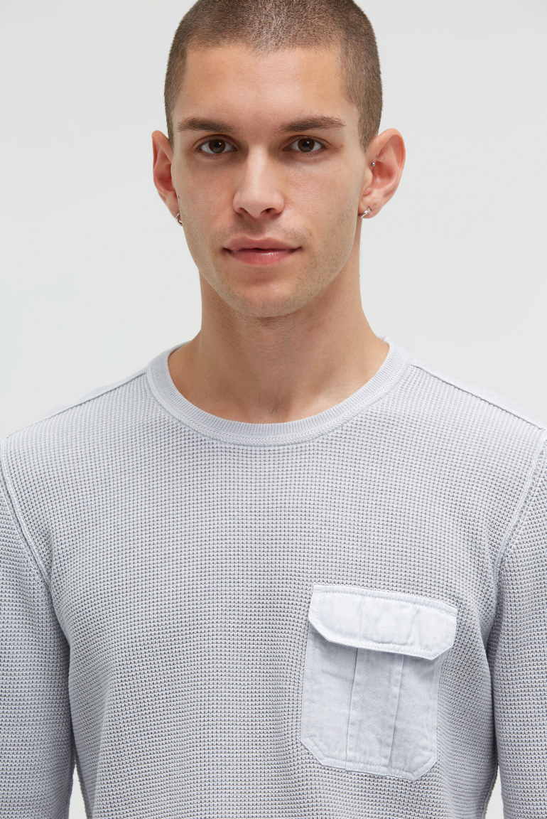 Pullover mit Strickmuster und Brusttasche